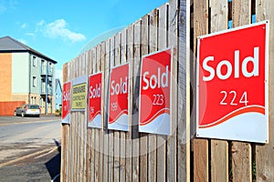 Row of sold signs