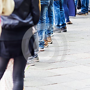 Row of spectators at the street