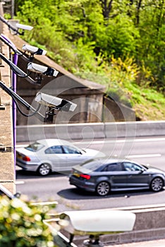 Row of Speed cameras monitoring traffic on UK Motorway