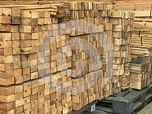 Row stack of wood in warehouse