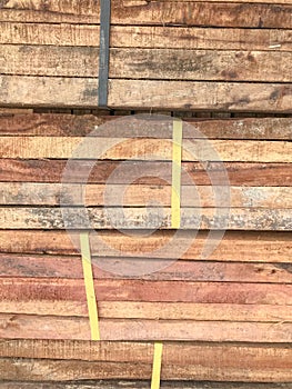 Row stack of wood in warehouse