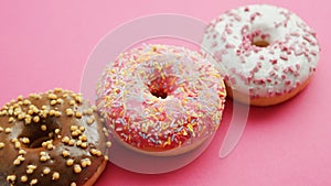 Row of sweet round doughnuts