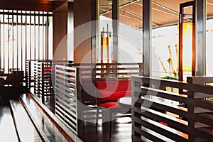 Row of tables and seats in empty restaurant