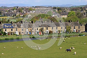 Row of terraced stone houses by canal, Lancaster