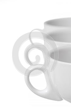 Row of Three Coffee Cups on White Background.