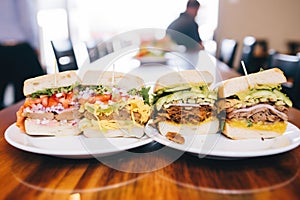 row of tortas made with different meats