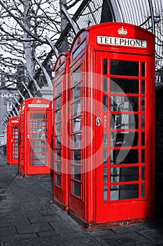 Row of traditional British red phone booths