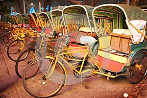 Row of trishaw, Macau