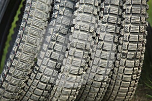 Row of used motorcycle tires