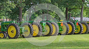 Row of Vintage John Deere Tractors