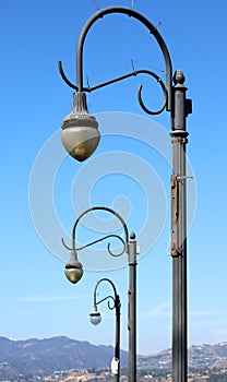 Row of vintage lampposts
