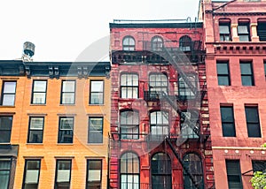 Row of vintage New York City apartment building facades