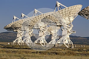 Row of VLA Very Large Array radio telescope dishes