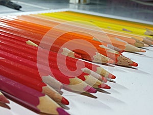 Row Of Warm Tone Colored Pencils 6
