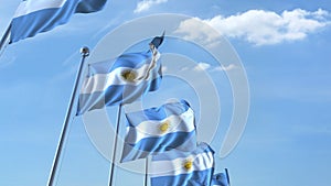 Row of waving flags of Argentina agaist blue sky, 3D rendering