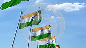 Row of waving flags of India agaist blue sky, 3D rendering