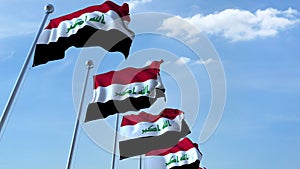 Row of waving flags of Iraq agaist blue sky, 3D rendering