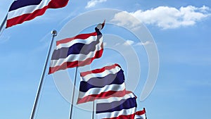 Row of waving flags of Thailand agaist blue sky, 3D rendering