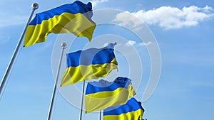 Row of waving flags of Ukraine agaist blue sky, 3D rendering