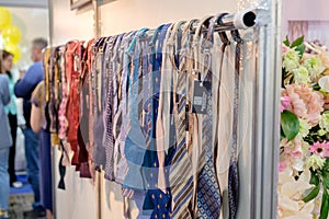 Row of wedding Neckties on hanger