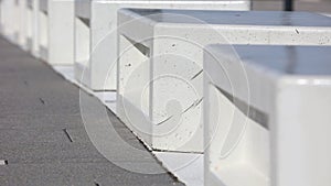 Row of white concrete blocks