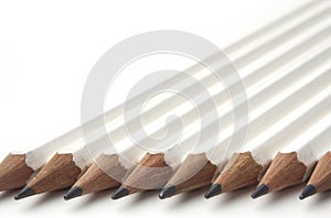 Row of white pencils