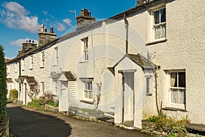 A row of whitewashed cottages in Ambleside, the English Lake Dis