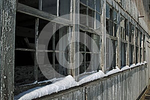 Row of windows on abandoned barn