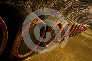 Row of Wine barrels in winery cellar