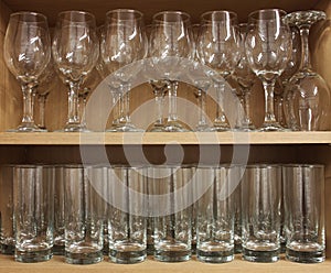 A Row of Wine Glasses and Glass Tumblers