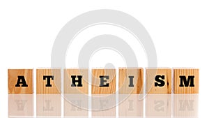 Row of wooden blocks spelling - Atheism photo