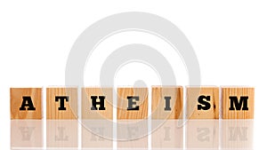 Row of wooden blocks spelling - Atheism