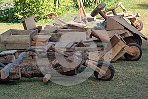 A row of wooden tricycles in the hilltribe village.