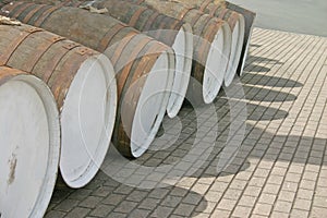 Row of wooden whisky barrels