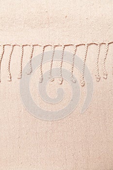 Row of woolen brown laces