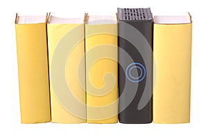 Row of yellow hardback books with a computer hard photo