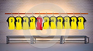 Row of Yellow and Red Football shirts Shirts 3-5