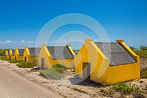 Row of yellow slave houses on Bonaire