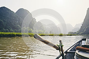 Rowboat against karst formation