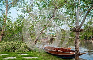 Rowboat on the brae beside of Canal with Thai lifestyle