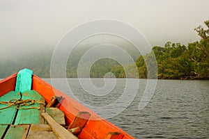 Rowboat in early morning mist