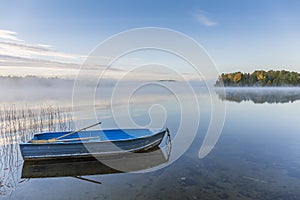 Rowboat on a Misty Lake in Autumn - Ontario, Canada