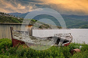 Rowboat out of order in idyllic landscape