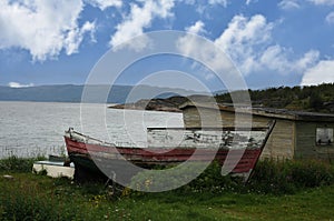 Rowboat out of order in idyllic landscape