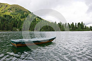 Rowing boat on mountain lake