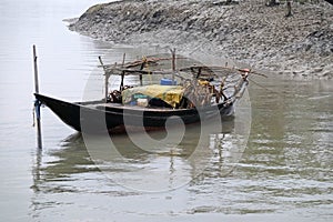 Rowing boat in the swampy areas of the Sundarbans, India