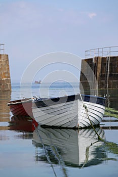Rowing Boats and Entrance to Mousehole Harbour photo