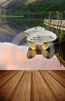 Rowing boats moored at jetty on Llyn Nantlle in Snowdonia Nation