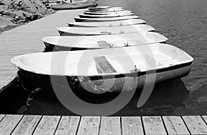 Rowing boats and pier