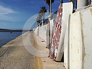 Rowing boats resting on the wall